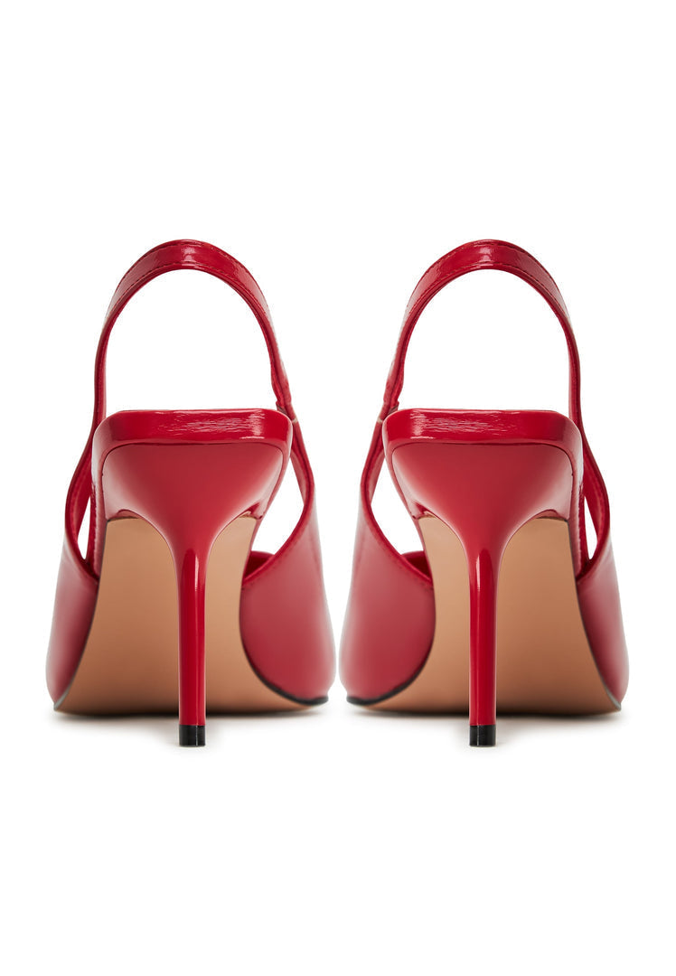 A stylish pair of red high heeled pumps for women, known as Harper red pumps, the perfect choice for elevating any outfit with their sleek design and bold red color.