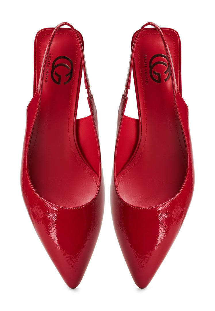 A stylish pair of red high heeled pumps known as Harper red pumps for women, perfect for adding a pop of color to any outfit with their on-trend red heels.