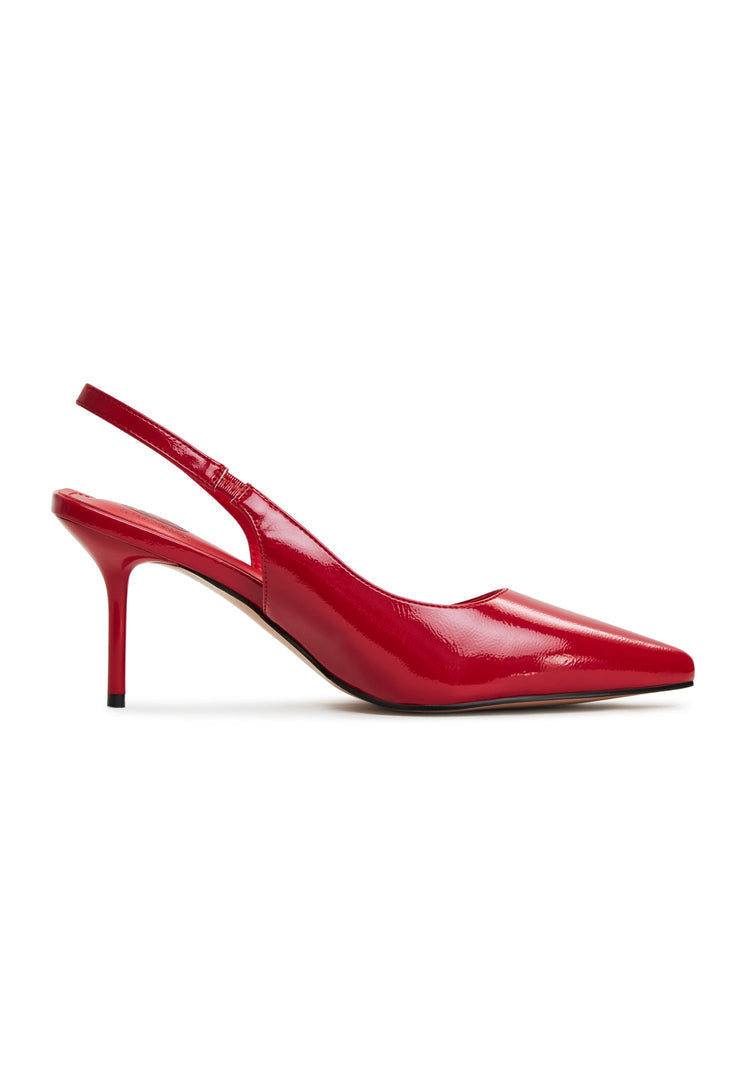 A pair of sleek red high heeled pumps, known as Harper red pumps, for women's fashion, showcasing stunning red heels and elegant design.