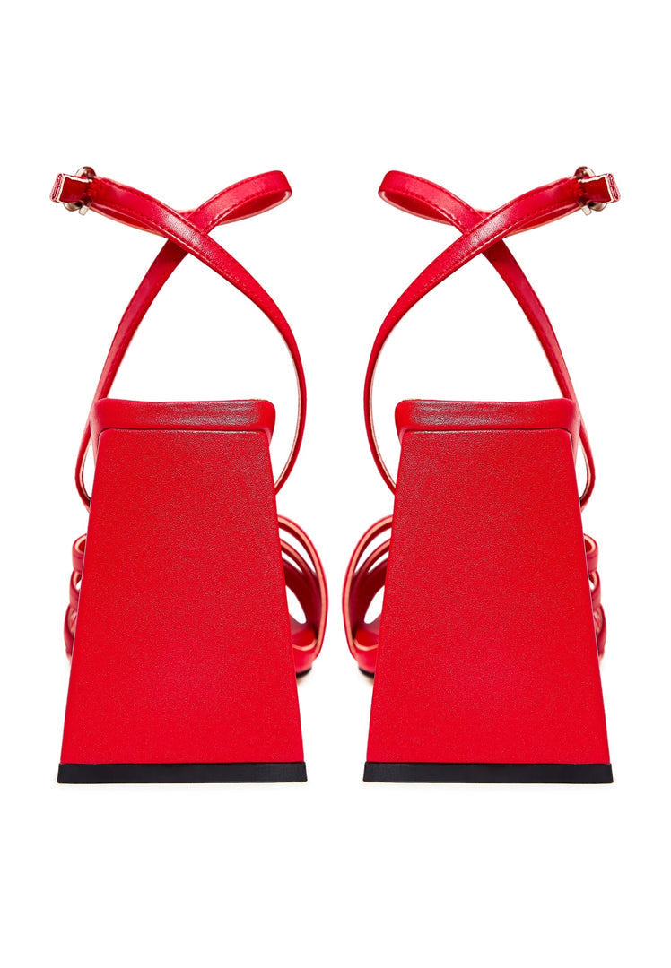A stylish pair of red chunky comfort sandals for women, the perfect blend of fashion and comfort in footwear.