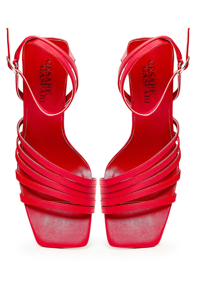 A pair of stylish red chunky comfort sandals for women - the perfect combination of fashion and comfort in comfortable footwear.