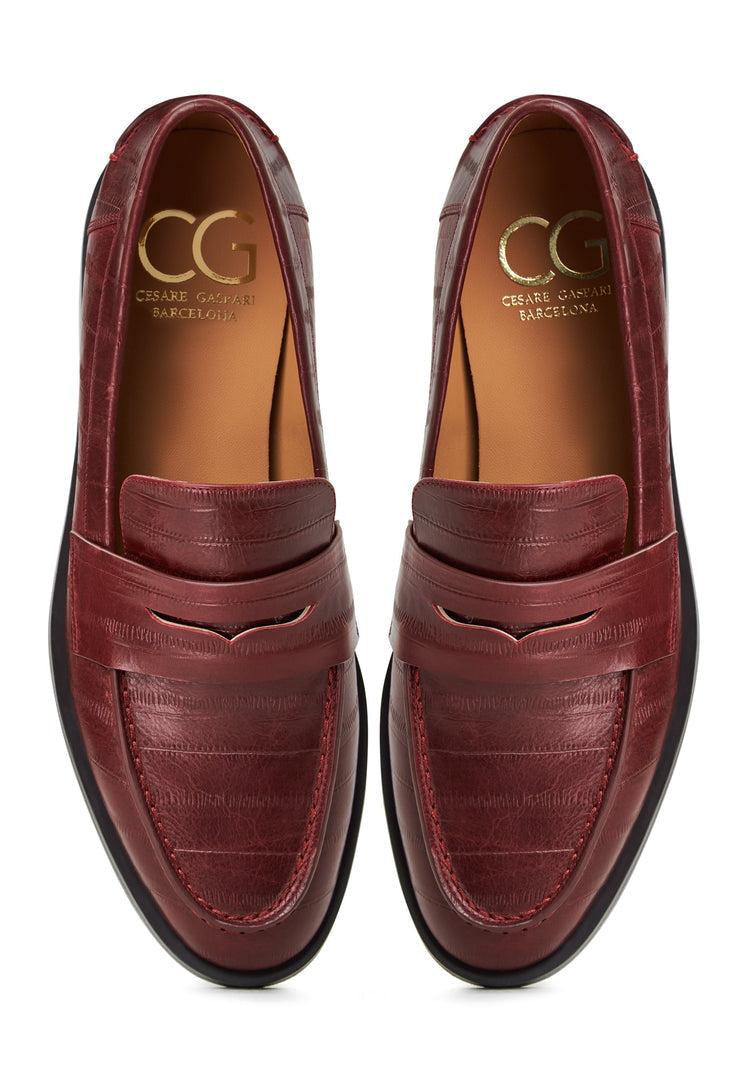 A stylish collection of women's loafers and fashionable block-heeled shoes in rich Bordeaux leather, perfect for adding a touch of elegance to any outfit.