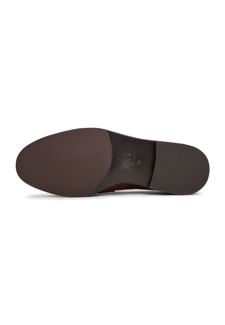 A fashionable pair of women's leather loafers in a rich Bordeaux color, featuring stylish block heels.