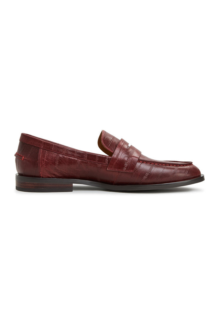 A stylish collection of women's leather loafers, block heeled shoes, and fashionable heels in Bordeaux color.