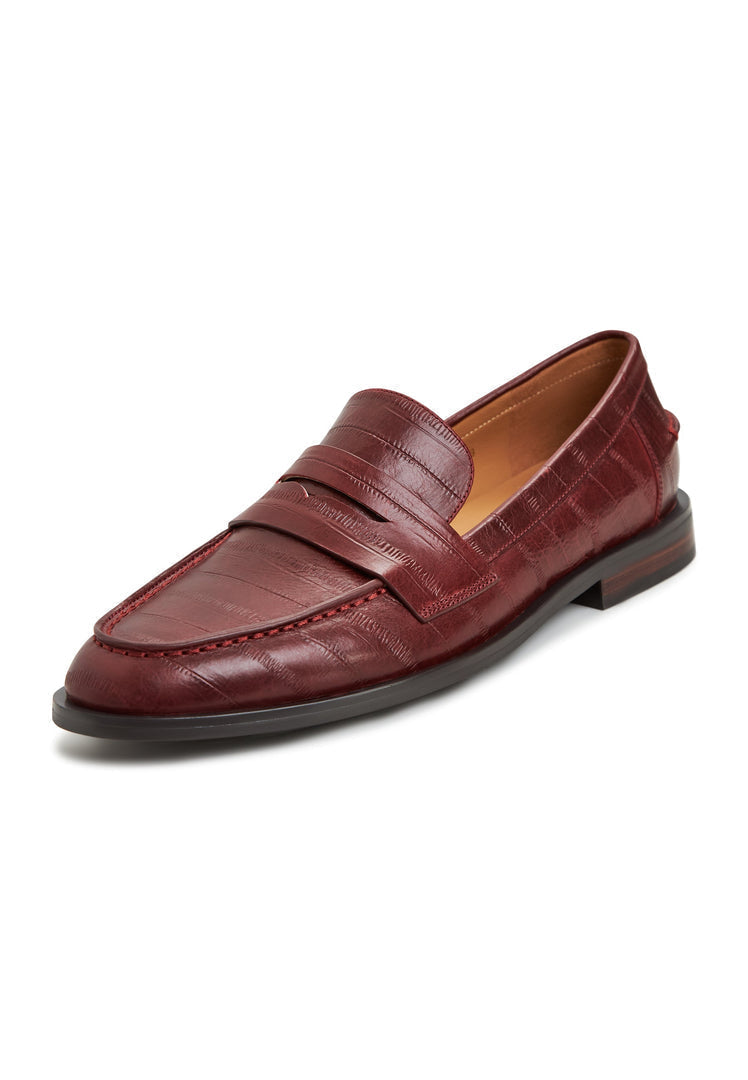 A stylish pair of block heeled leather loafers in Bordeaux, perfect for women who love fashionable heels.