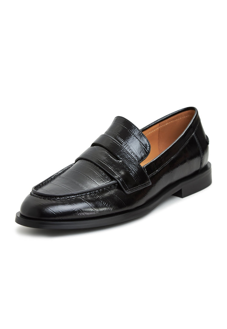 A stylish pair of black leather block heeled loafers for women - perfect for a classy and chic look.