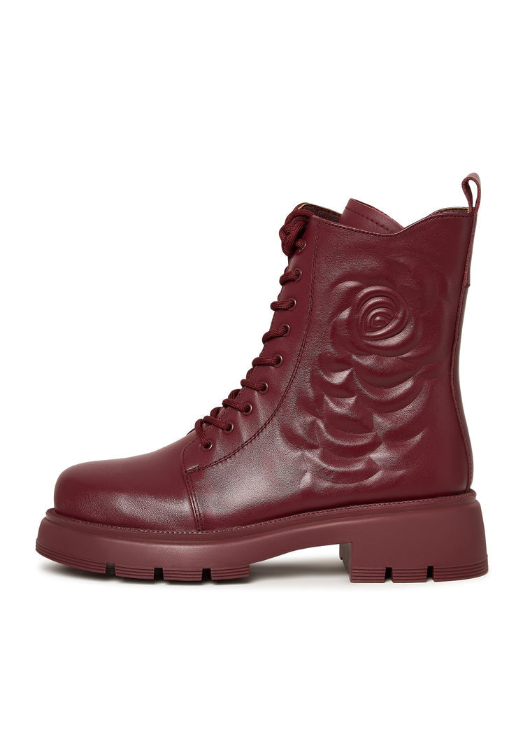 A pair of stylish Bordeaux leather platform ankle boots for women, featuring high heels and perfect for a fashionable look.