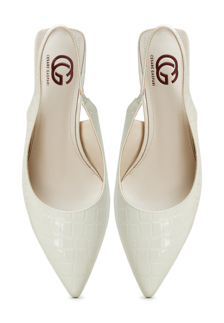 A pair of stylish white Harper pumps high heeled shoes, a fashionable choice in women's footwear for any occasion.