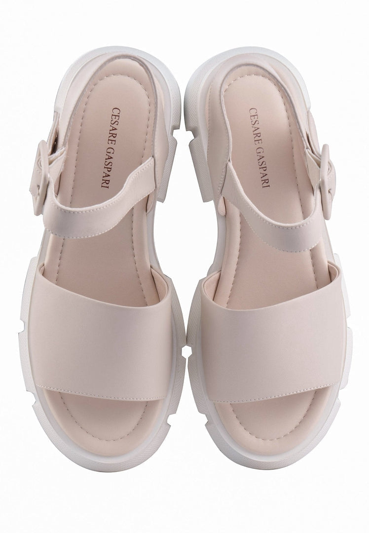 A pair of trendy chunky platform sandals with a thick elevated sole, perfect for a stylish and comfortable look.