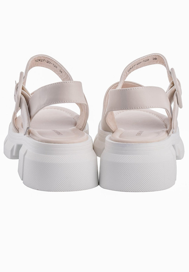 A pair of trendy chunky platform sandals featuring thick elevated soles.