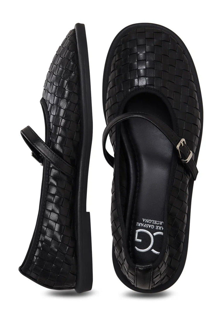 Elevate your style with these elegant black Mary Janes featuring a woven design - the perfect fashion-forward choice for women's footwear.