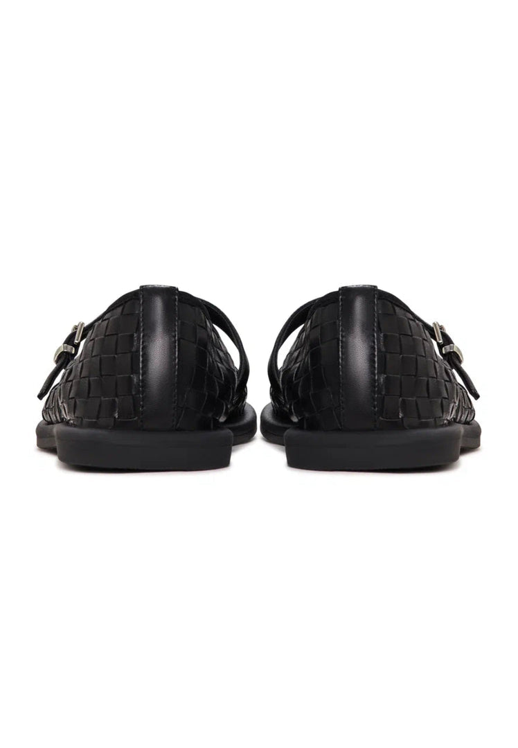 A stylish pair of black Woven Elegance Mary Janes, the perfect fashion statement for women who love elegant woven details in their shoes.