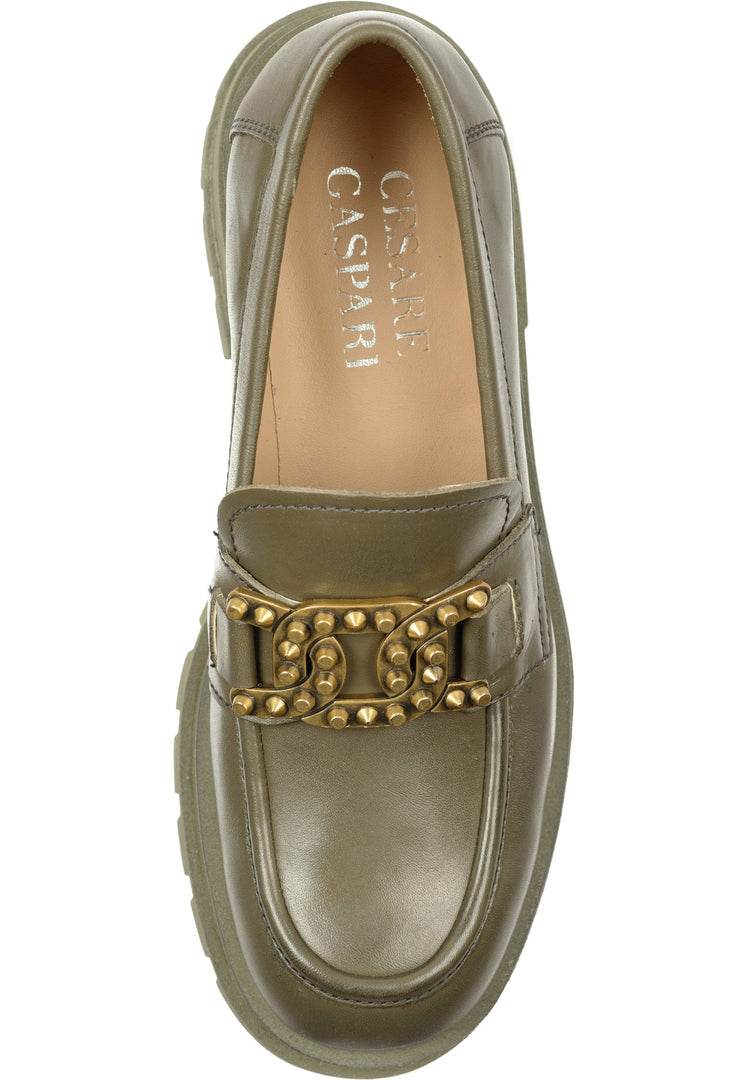 A stylish pair of dark green studded chunky loafers, great for women's fashion footwear.