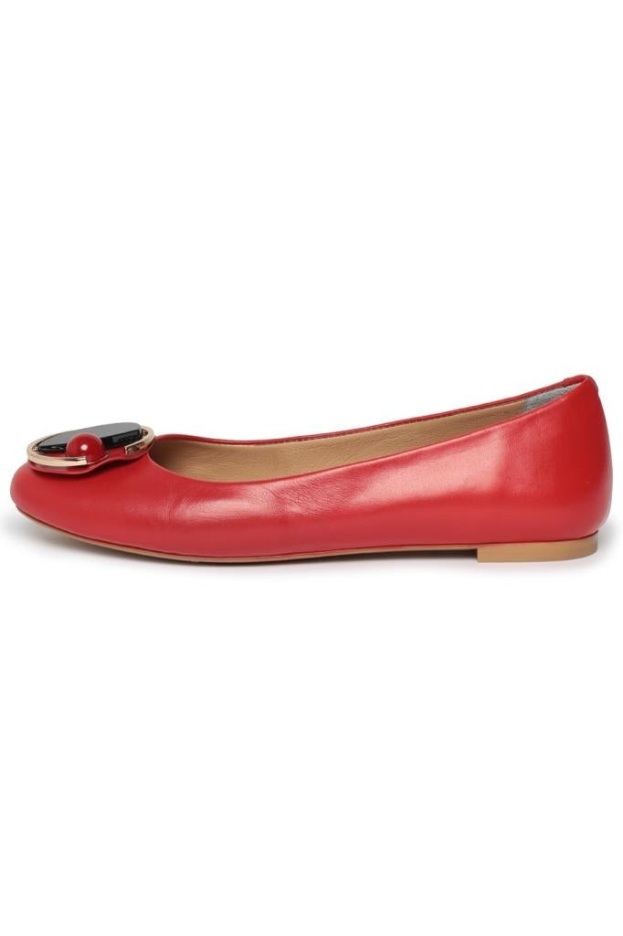 Stylish red geometric ballet flats, a modern twist on classic ballet shoes.