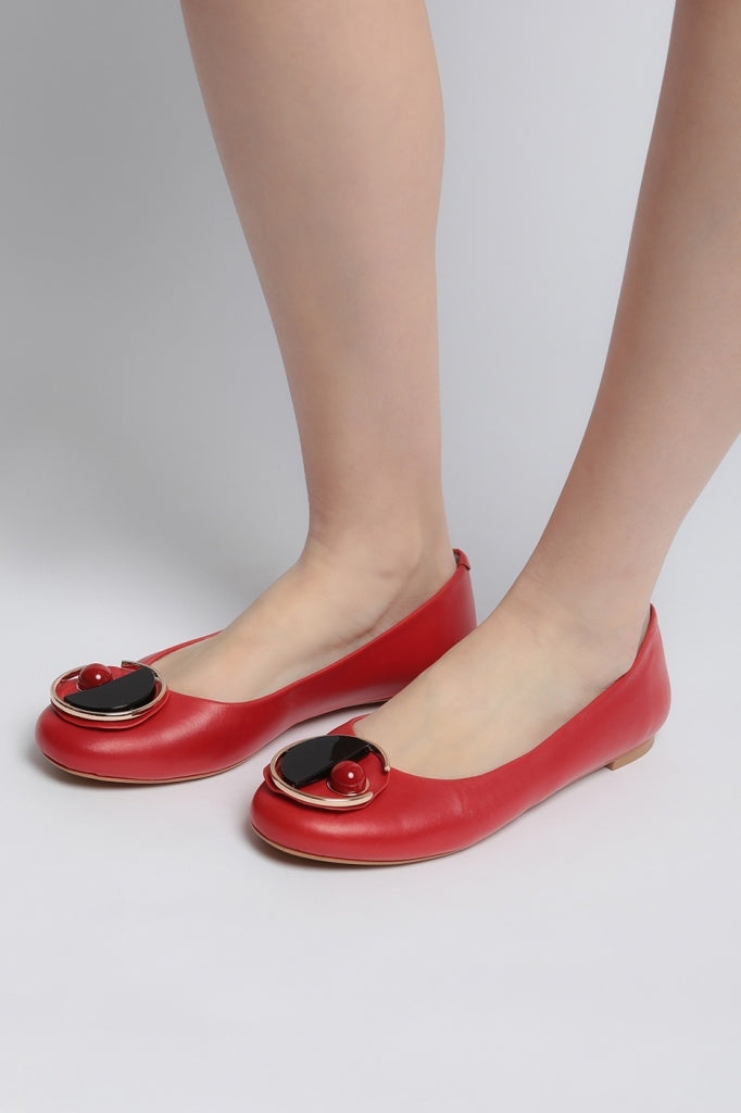 Stylish red geometric ballet flats, a modern choice for trendy footwear enthusiasts.