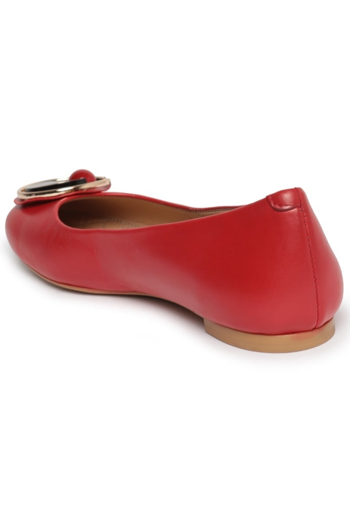 A stylish pair of modern red geometric ballet flats, perfect for any occasion.