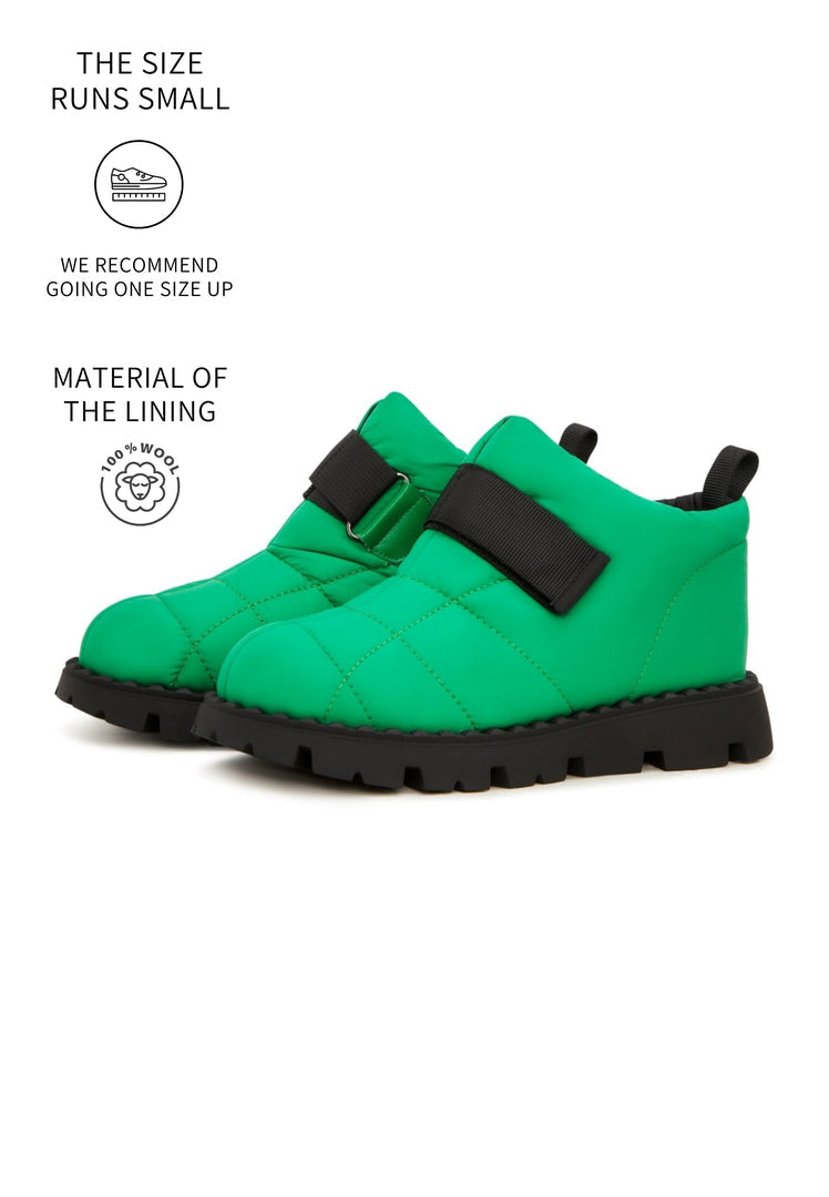 Stay warm and stylish this winter with green suede wool-lined boots.