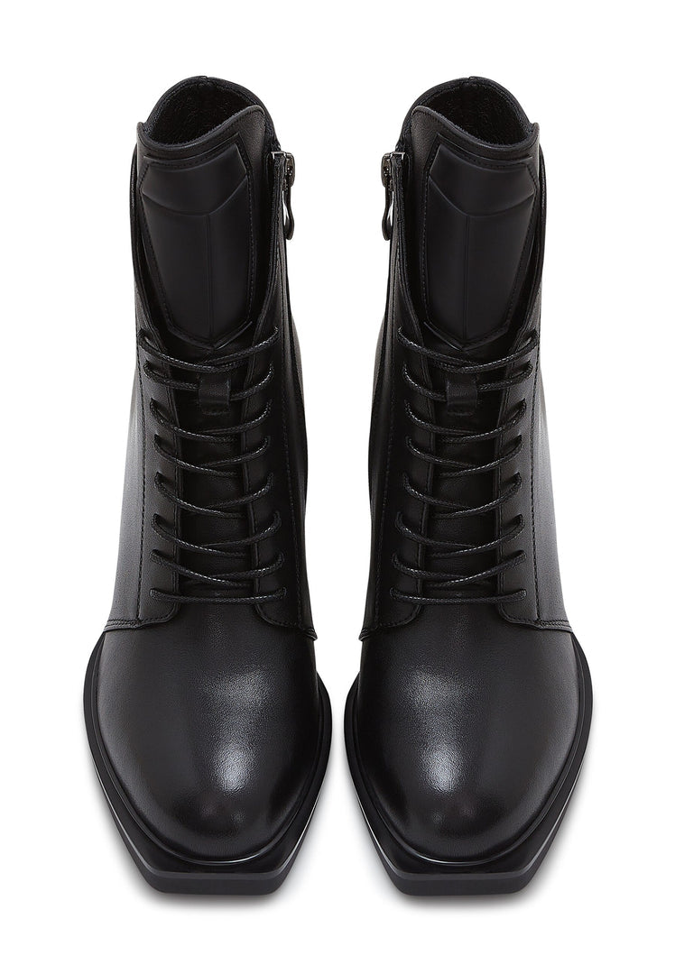 A stylish pair of black leather lace-up ankle boots known as the Behati boots.