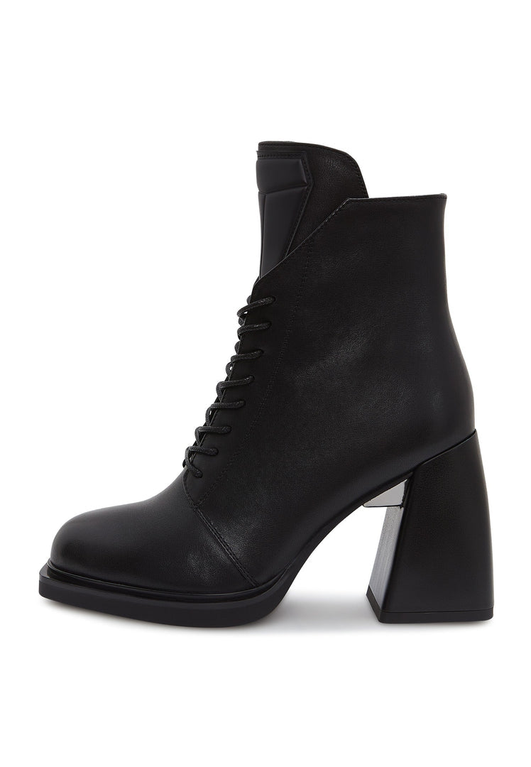 A stylish pair of black leather lace-up ankle boots, also known as Behati black boots, perfect for adding a touch of edge to any outfit.