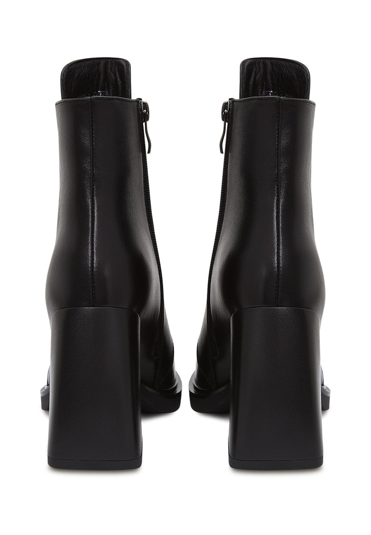 A stylish pair of black leather lace-up ankle boots, known as Behati black boots, perfect for any outfit.