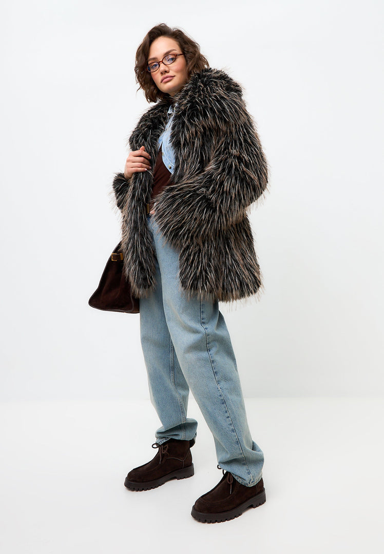 A pair of stylish brown suede lace-up ankle boots by Mavi, perfect for women's fashion.