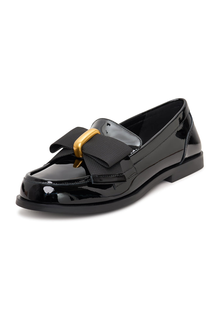 Elegant patent black women's shoes with a gold bow inspired by Dorothy's style.