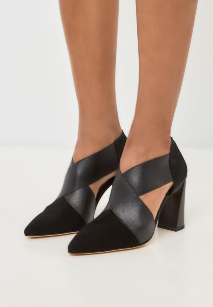 A stylish pair of black strappy high heels with block heels - perfect for any occasion!