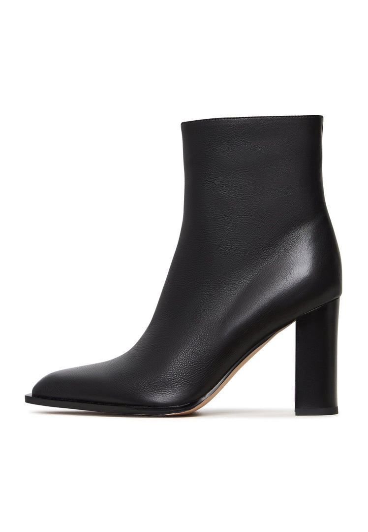 A pair of fashionable Athena black block heel boots, a chic choice for women's black boot lovers.