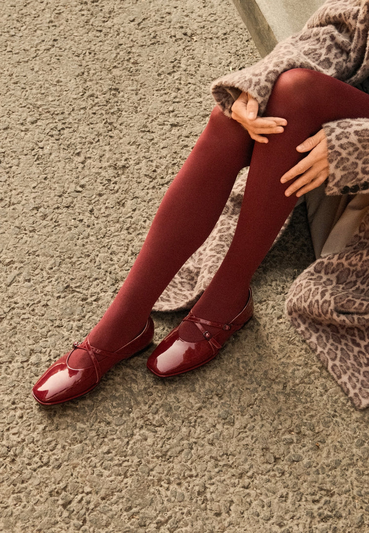 A stylish pair of red leather ballerinas, perfect for women looking for comfortable and chic leather flats like the Albina ballerinas.