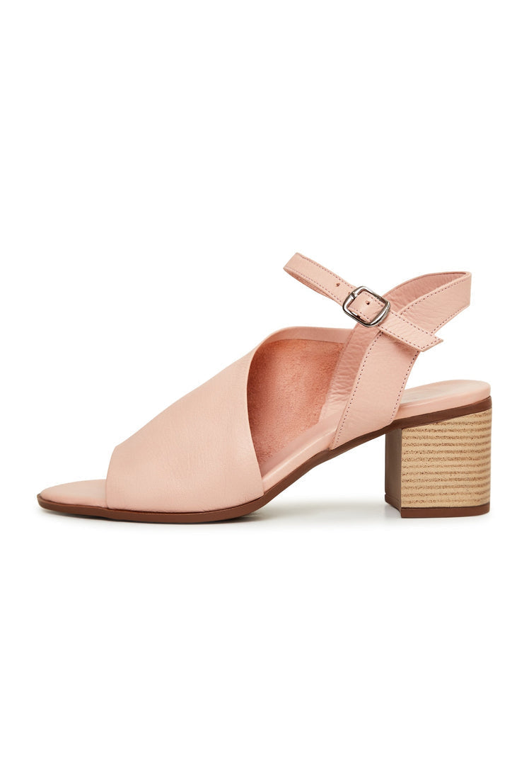 A trendy pair of women's pink leather block heel sandals with a chunky heel design perfect for any occasion.