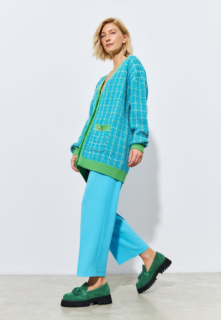 A stylish pair of green platform loafers by Ksenia, perfect for women's footwear enthusiasts.