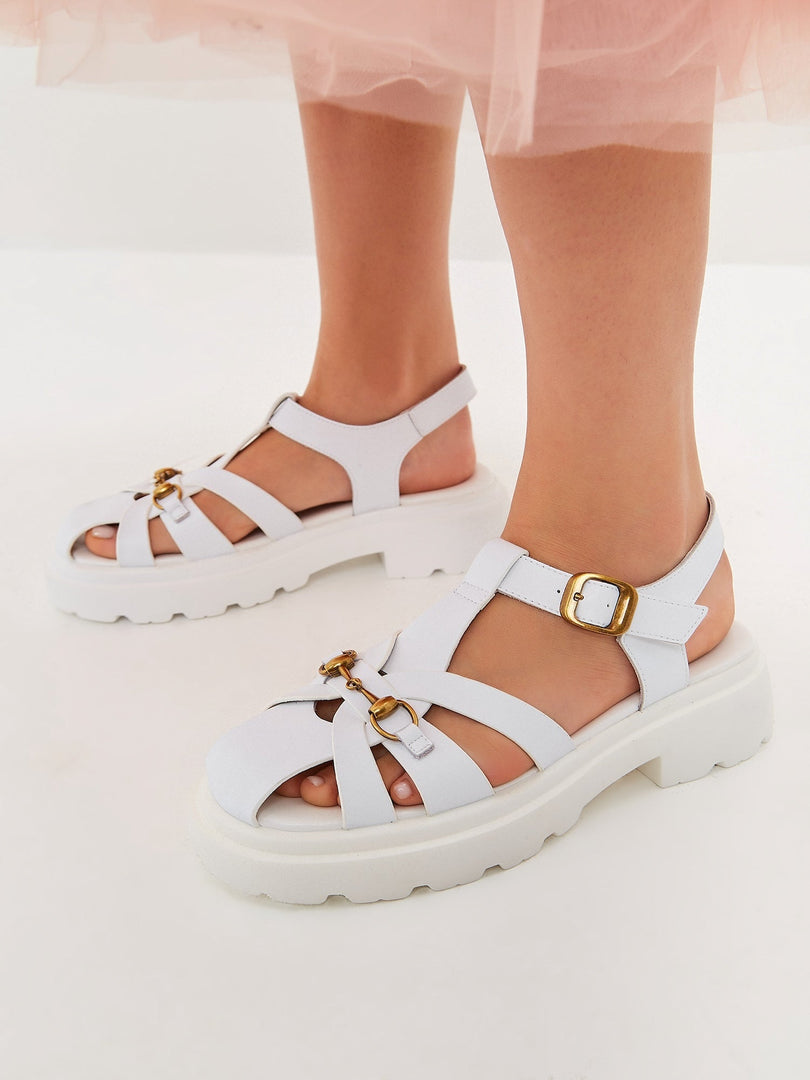 A stylish pair of urban classic platform sandals in white, perfect for any modern outfit.