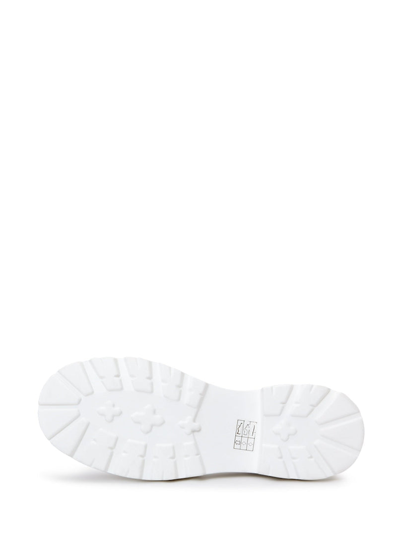 A pair of urban classic white platform sandals styled for the modern fashionista.
