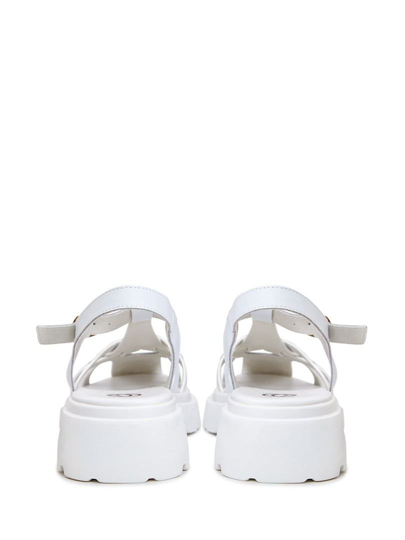 A pair of trendy urban classic platform sandals in white, perfect for a chic and stylish look.
