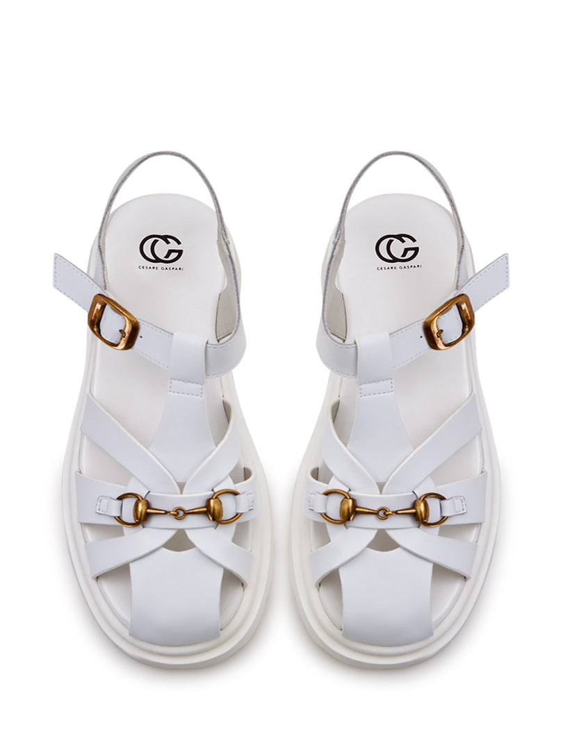 A stylish pair of white platform sandals - the epitome of urban classic fashion.