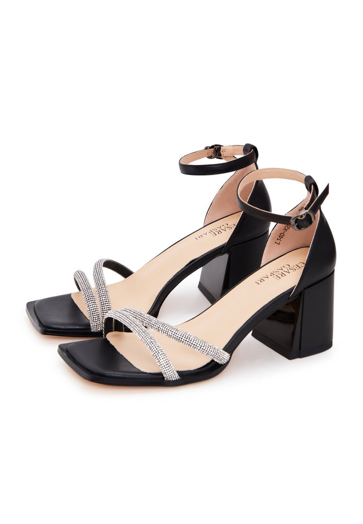 A stylish pair of black leather block heel sandals with an open toe design, perfect for any occasion.