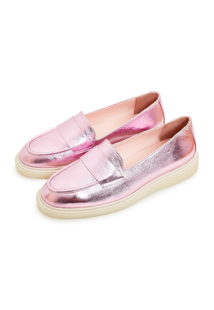 A pair of stylish metallic pink women's loafers with a flat sole, perfect for fashion-forward individuals looking for fashionable footwear.