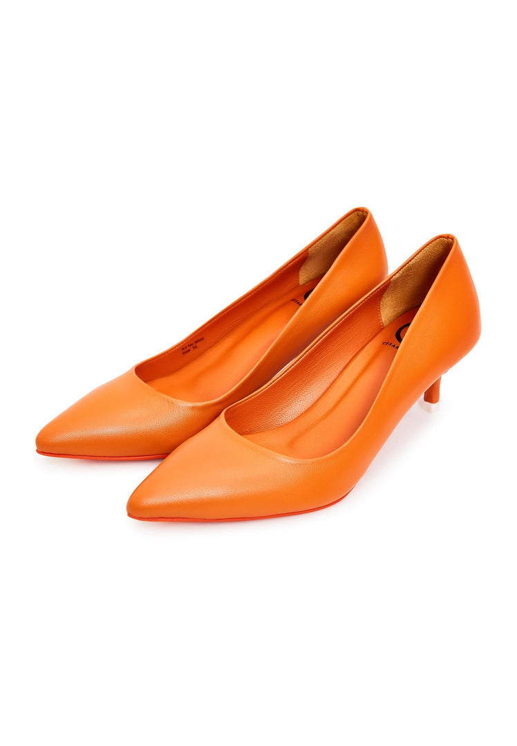 A pair of elegant orange designer pumps - high-end footwear for a luxurious look.