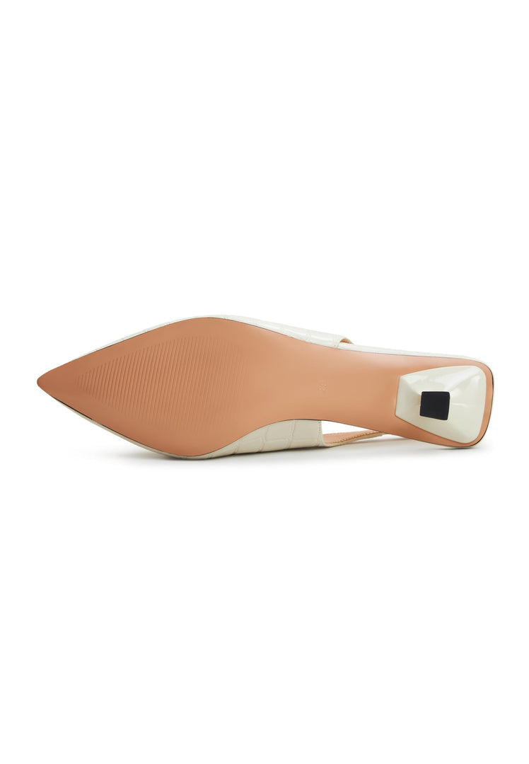 A pair of elegant stiletto heels in off white color, perfect for women's footwear fashion lovers.