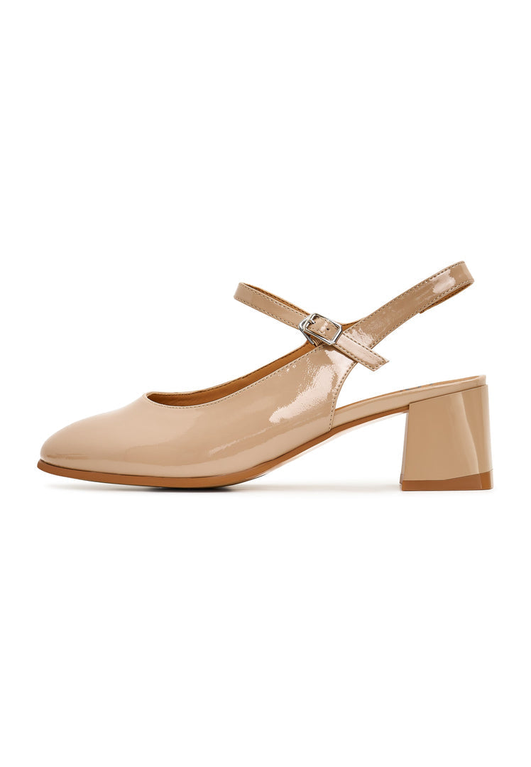 A fashionable pair of beige Nina slingback pumps, the perfect women's dress shoes for any occasion.