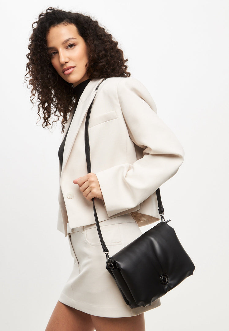 A stylish black quilted clutch bag, perfect for a night out or special occasions.