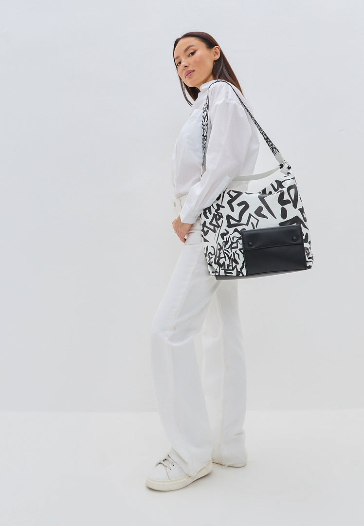 A sleek black and white monochrome handbag - perfect to buy for a stylish look.