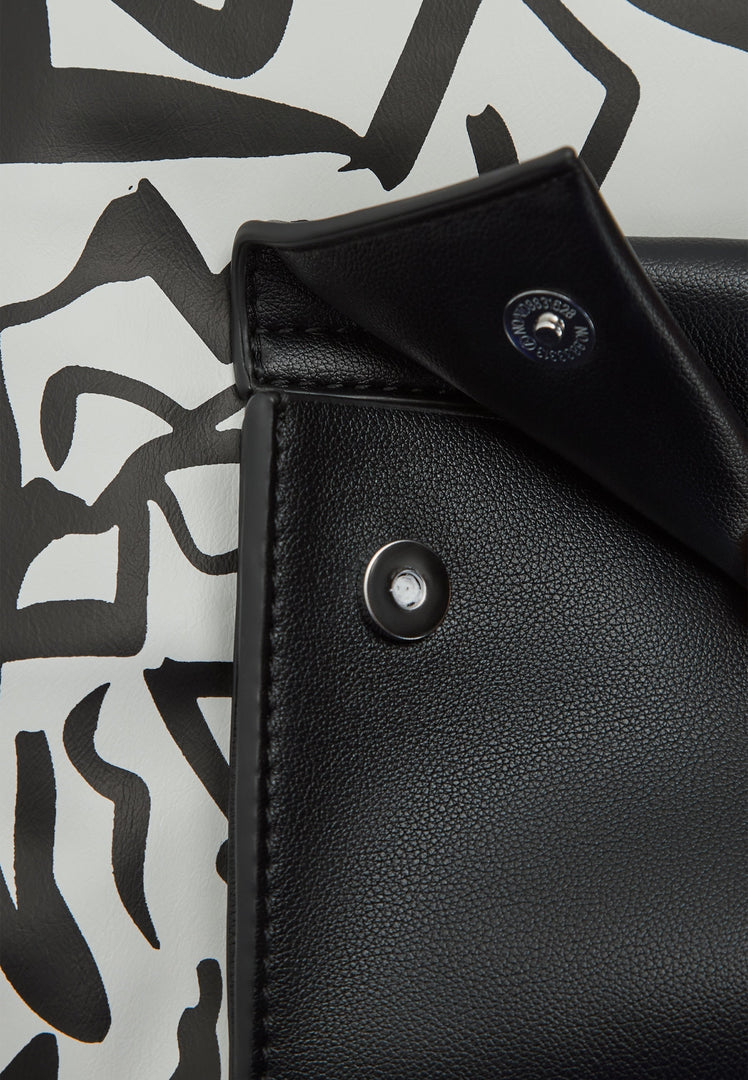 A fashionable monochrome handbag for sale - buy your perfect accessory now.