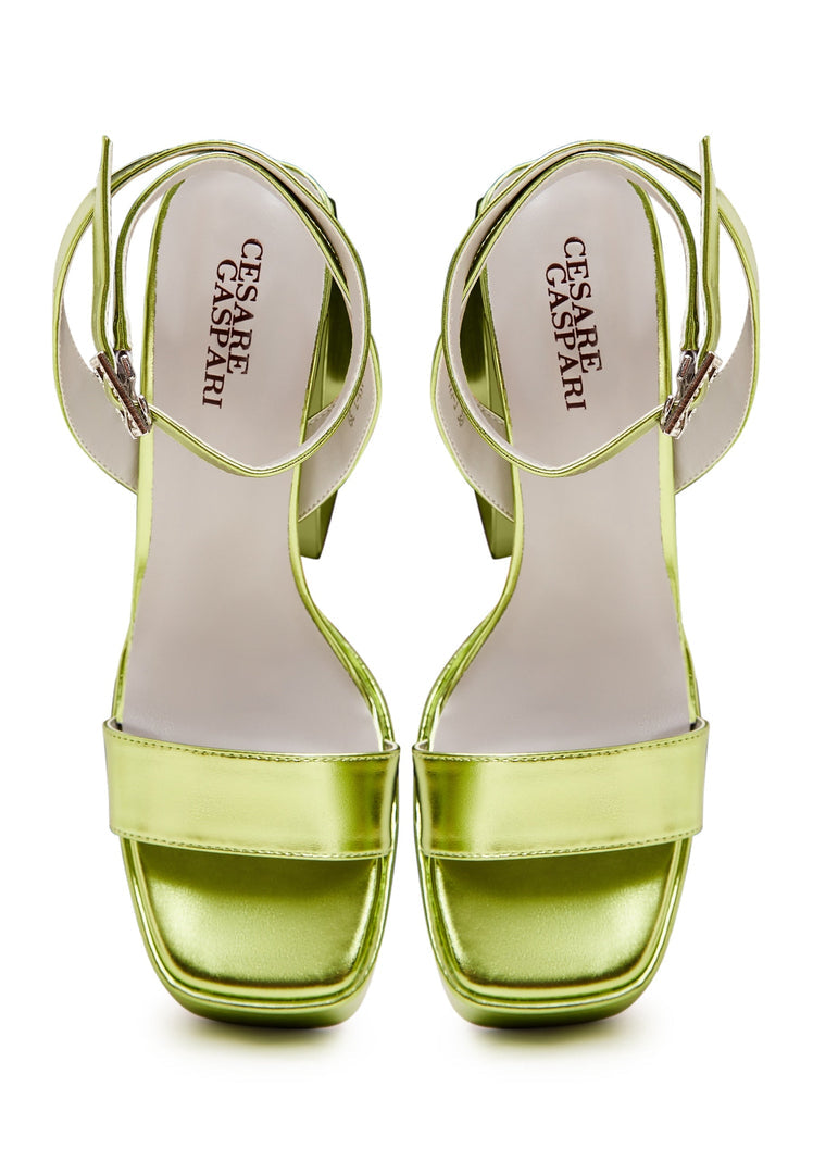 A pair of elegant yellow sandals, perfect for elevated footwear and stylish women's fashion shoes.