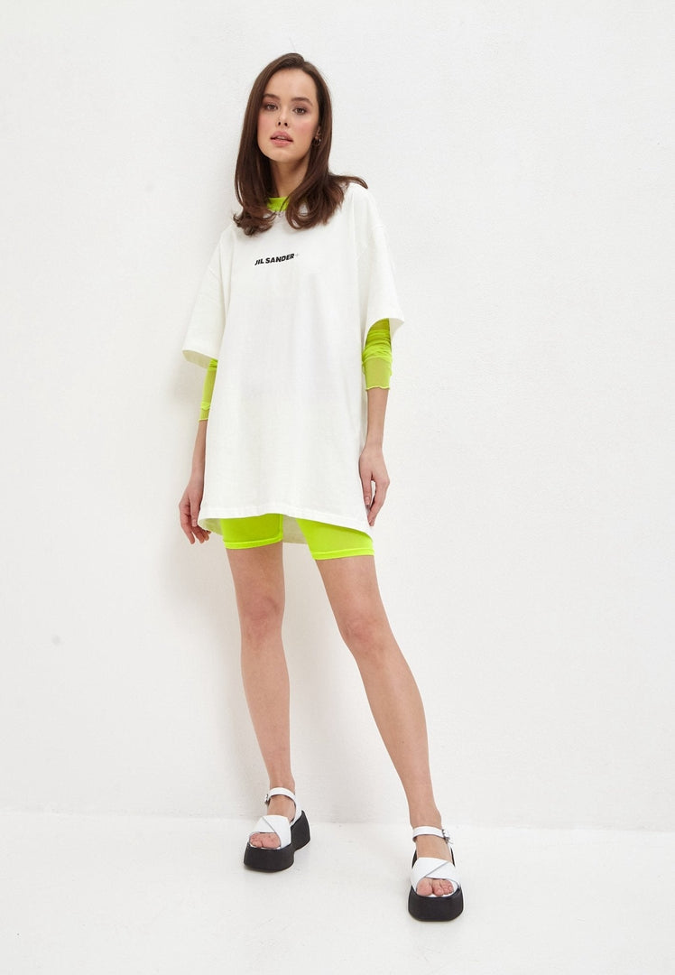 A stylish pair of white leather platform sandals perfect for any summer outfit.