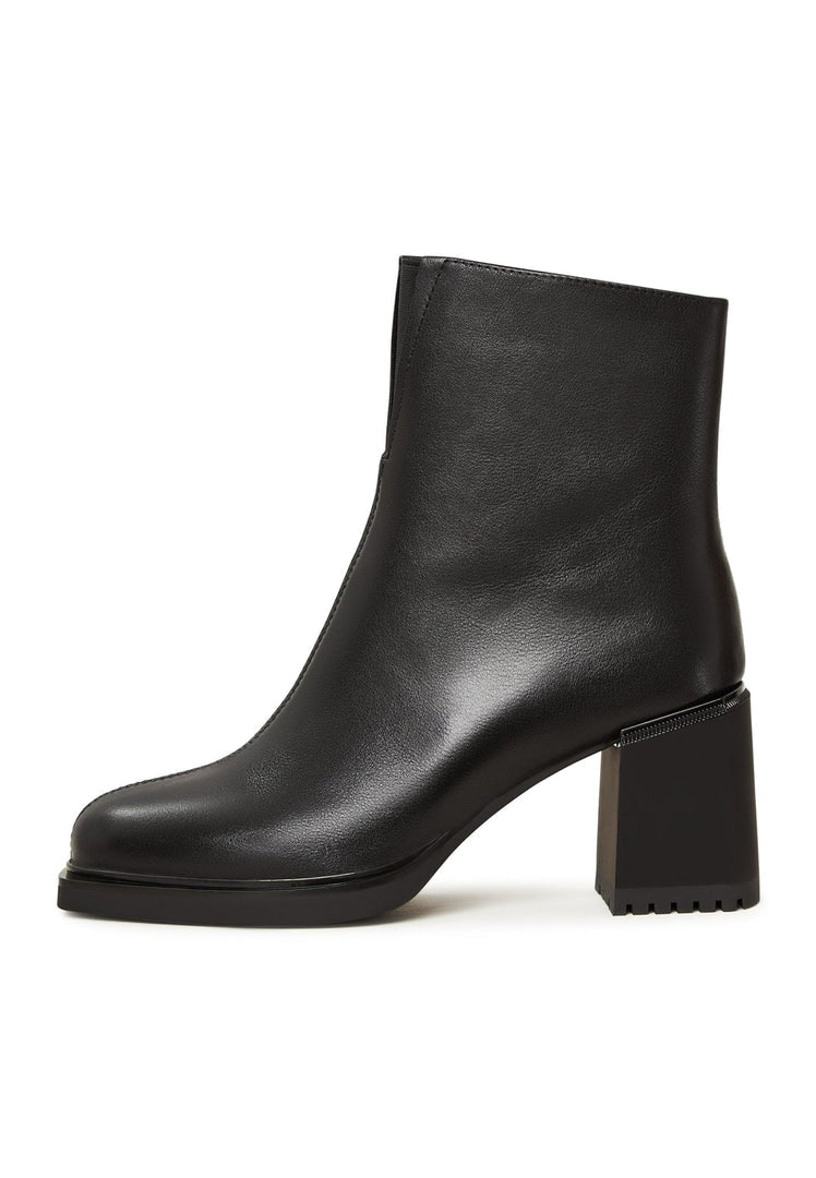 A stylish pair of women's fashion ankle boots in black, featuring a casual design with high heels, perfect for any outfit.