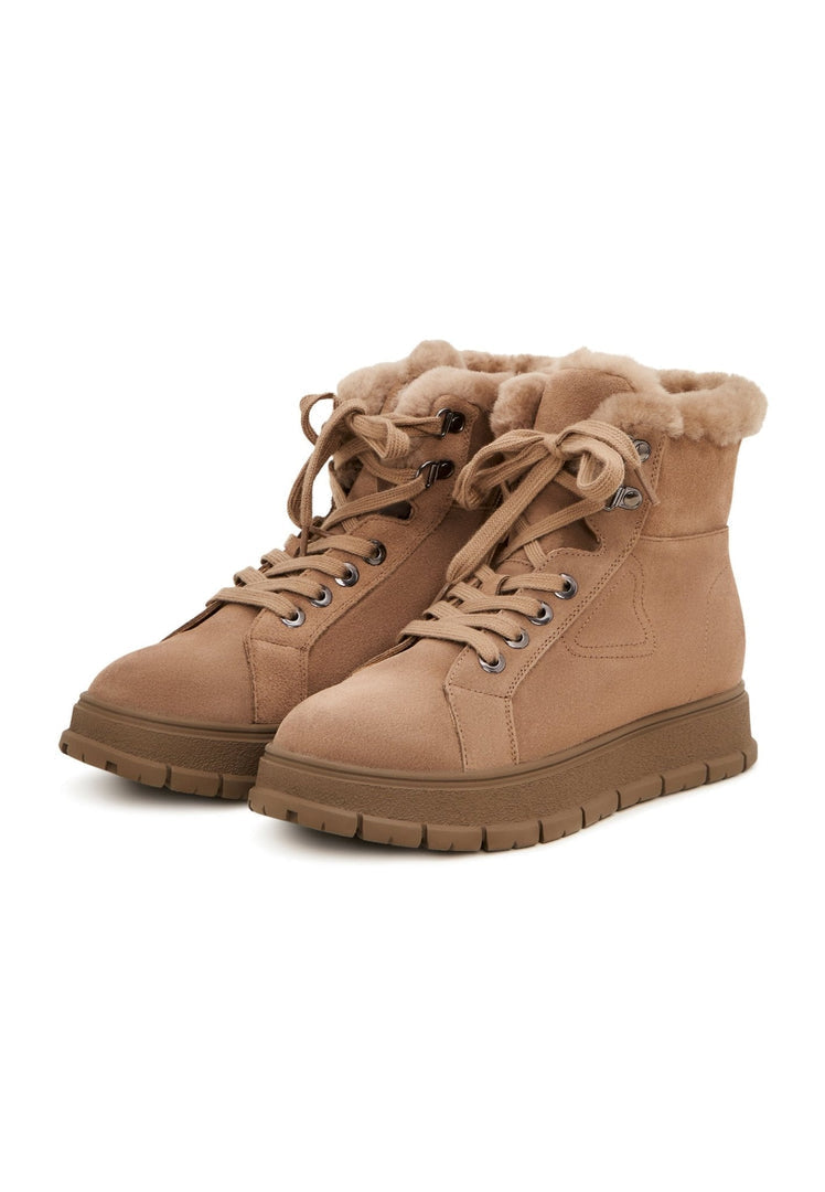 Fashionable winter footwear: women's suede winter boots and men's suede boots perfect for the cold season.