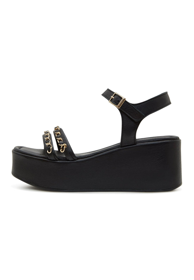 A stylish pair of black platform sandals for women with eye-catching gold chain accents, perfect for a fashionable and chic look.
