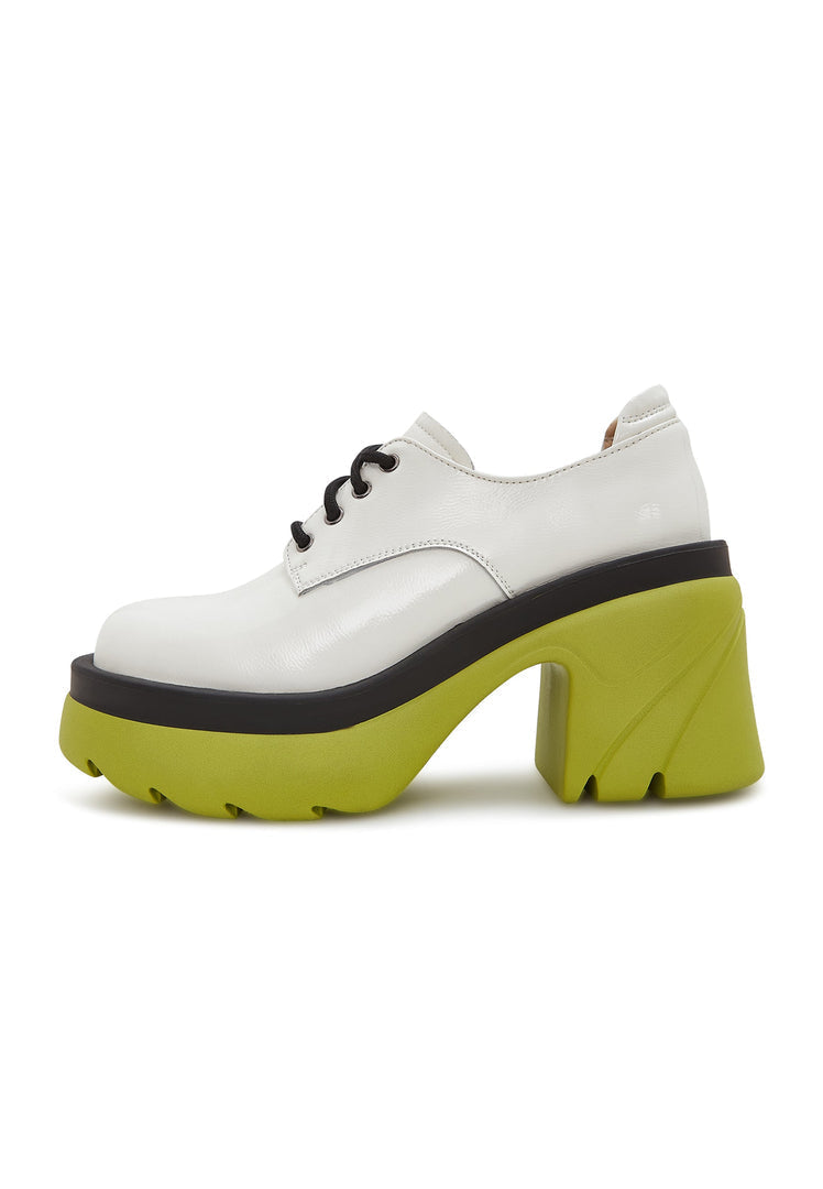 A stylish pair of women's fashion oxfords in white, featuring bold chunky block heels and lace-up design.