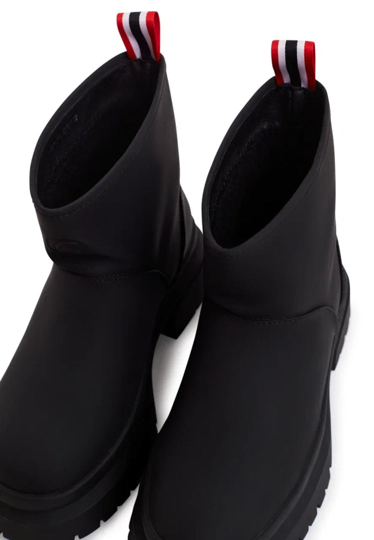 A pair of stylish pull-on black winter boots, the perfect classic footwear for the season.